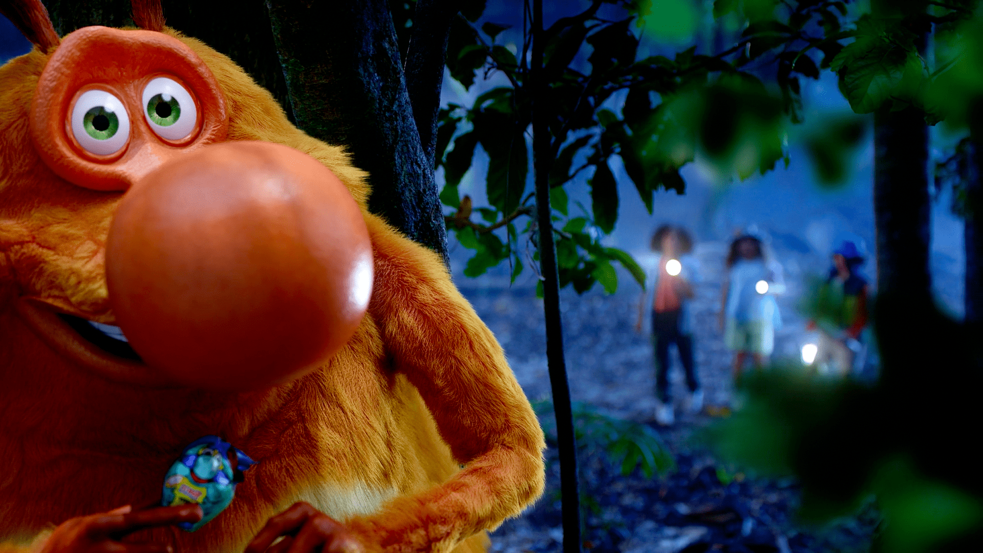 Friendly orange monster hiding in forest playful kids entertainment animation and character storytelling project